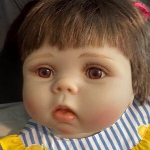 Adorable Baby Doll with Brown Hair